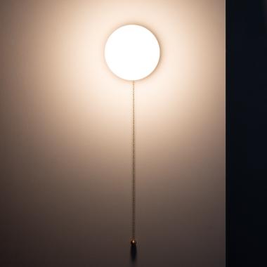 Product of Gold Orbit Wood and Glass Wall Light